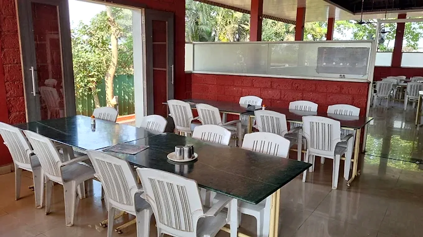 Open-air garden seating at Hotel Atithi